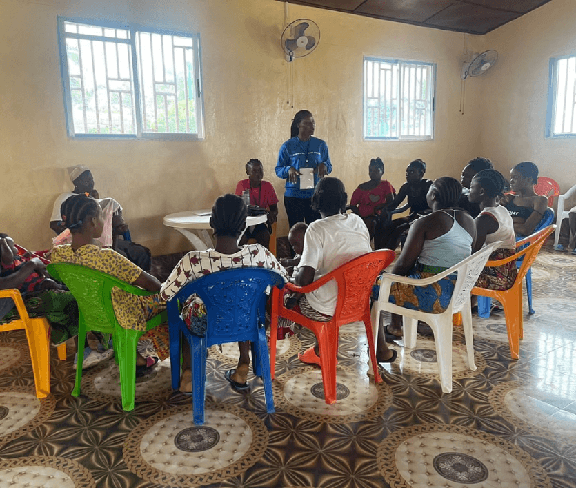 BDI staff conducting a meeting on menstrual hygiene in Liberia