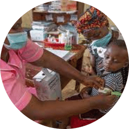 vaccinating a child in Liberia